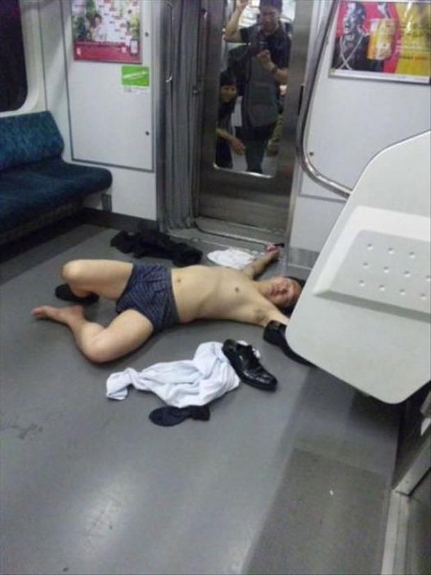 drunk man passed out on the subway in his underwear