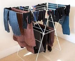 A drying rack full of clothes