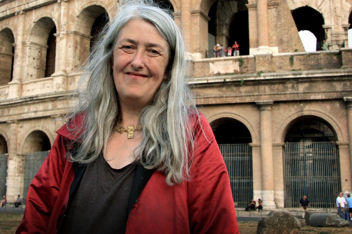 Mary Beard standing in front of Colosseum 