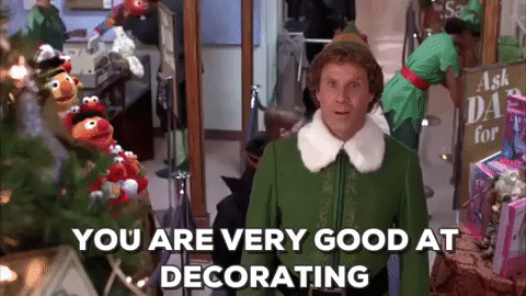 christmas elf talking about christmas decorations