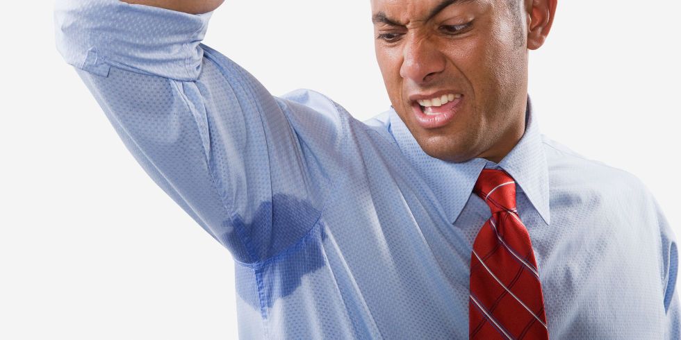 man with large armpit sweat stain